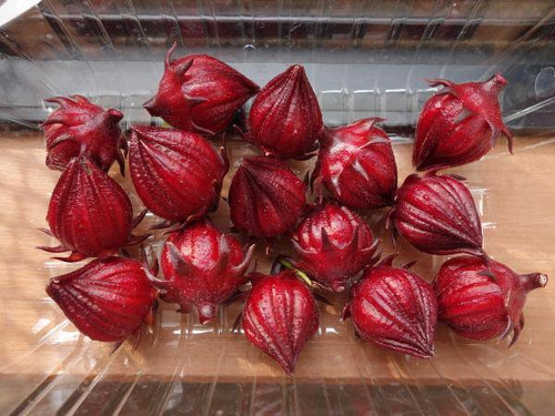 Sun-drying of fruits of Roselle